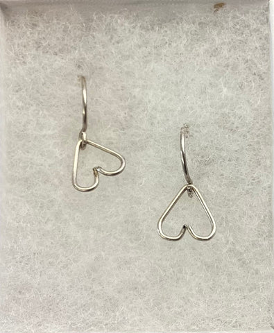 Base metal earrings with Sterling Silver ear wire by Iris